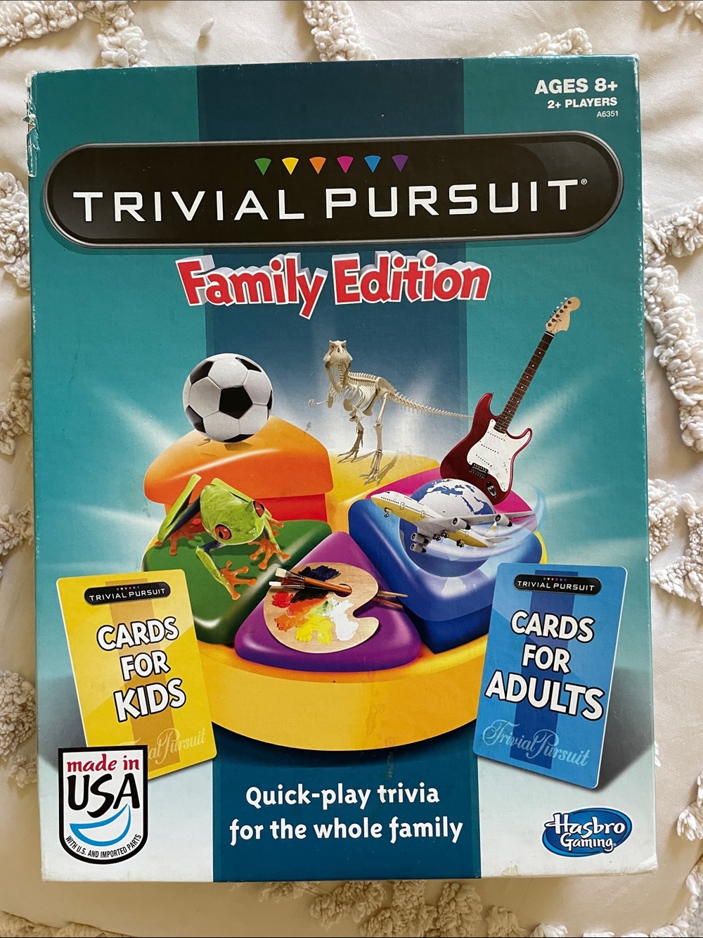 Hasbro Trivial Pursuit Family Edition - Teal Box with Multi-colored Wedges